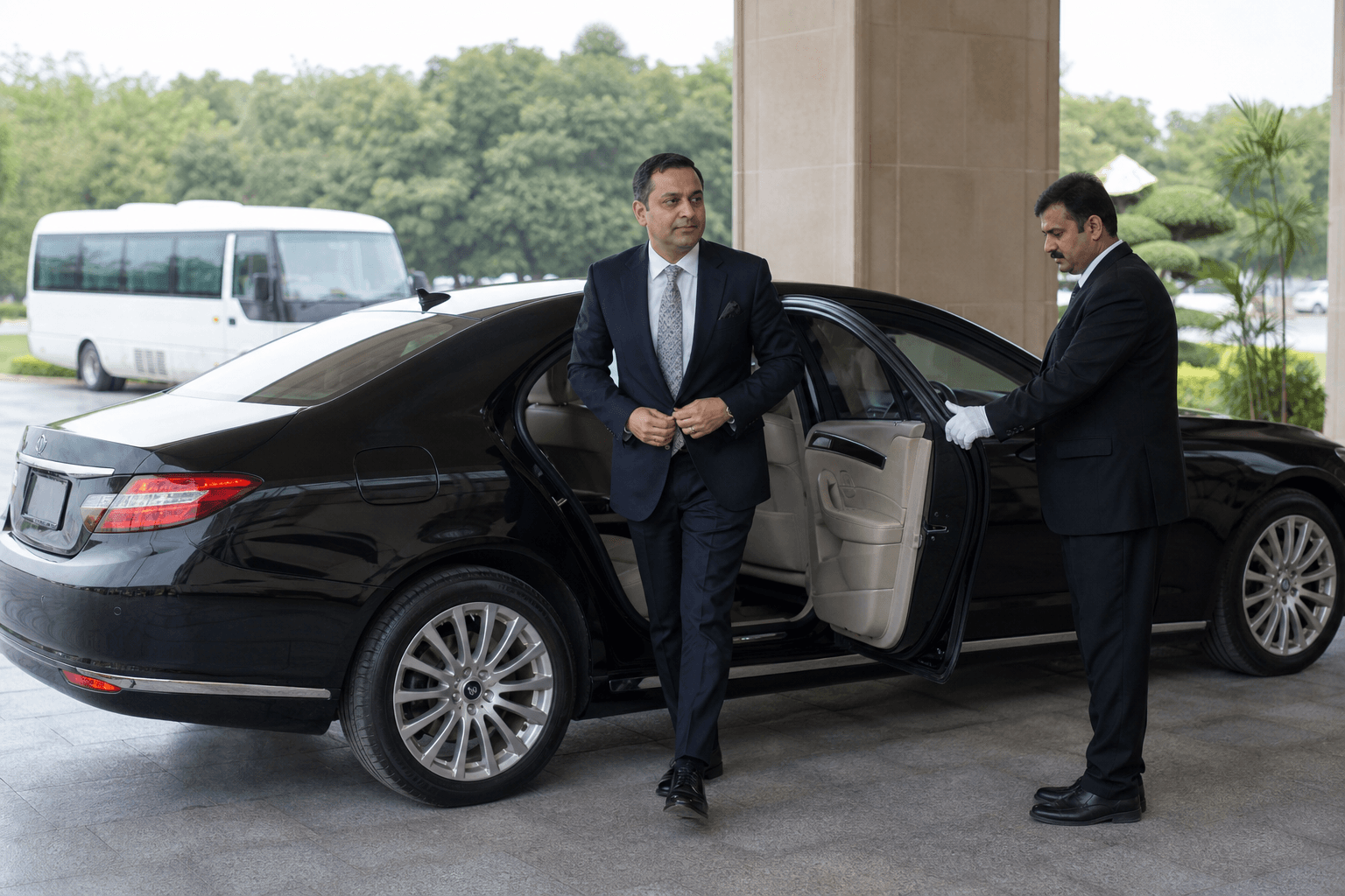 Conference speaker arriving by dedicated executive car at an Islamabad venue